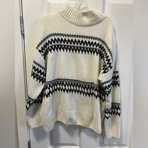 Christian Siriano Chanel Mark neck sweater
